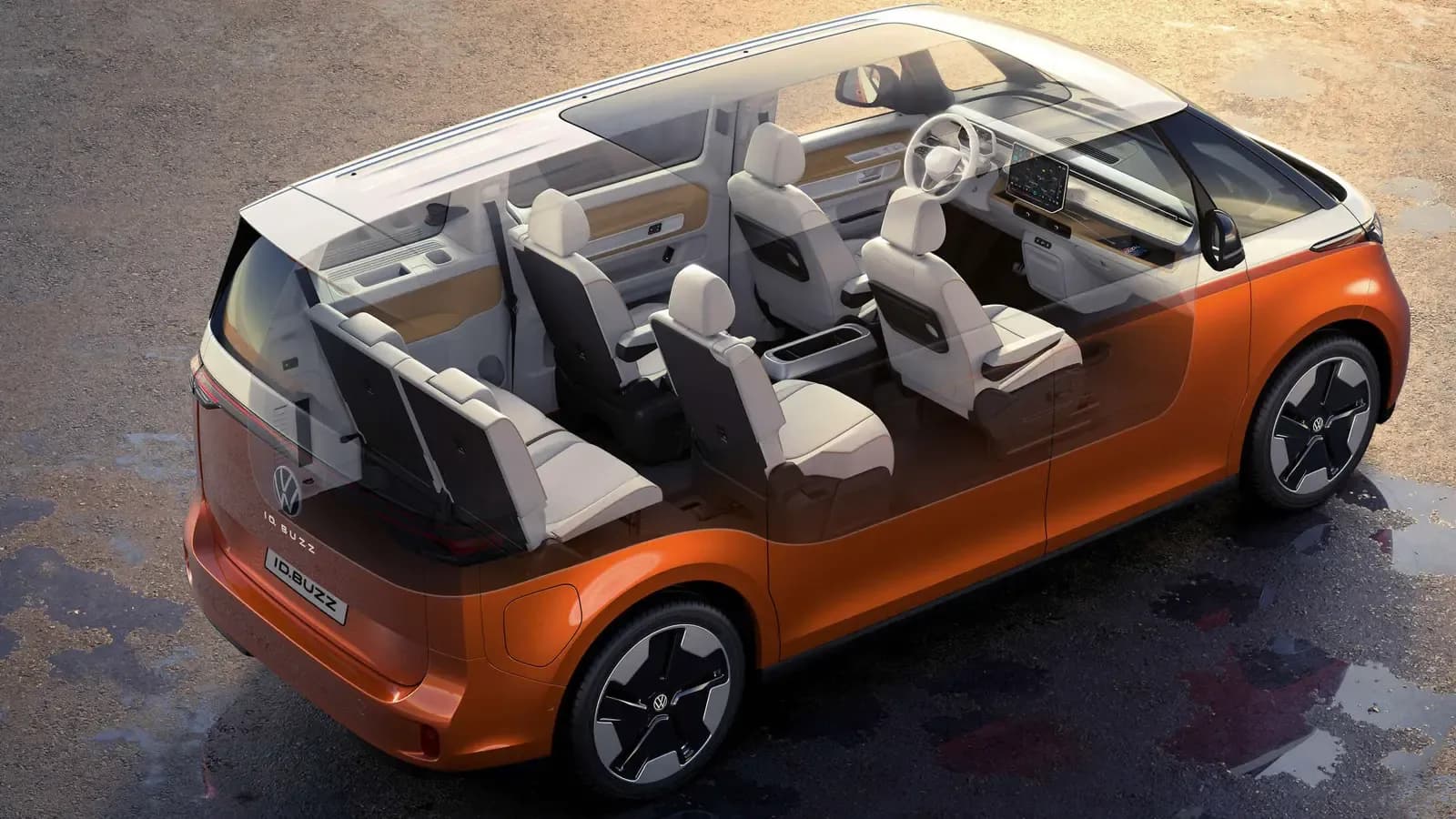 Interior and Exterior shot of metallic orange Volkswagen ID. Buzz