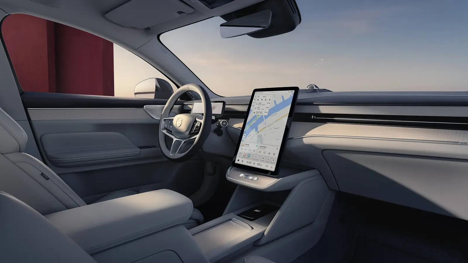 Volvo ES90 drivers side view gray interior.