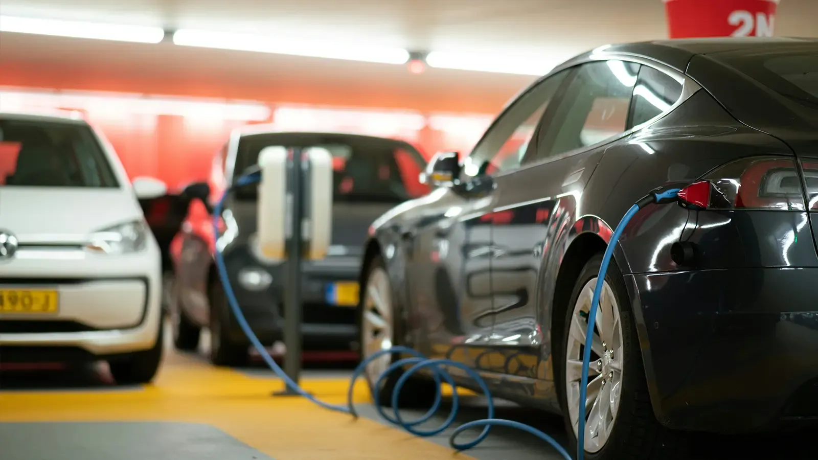 EV car being charged in a a garage