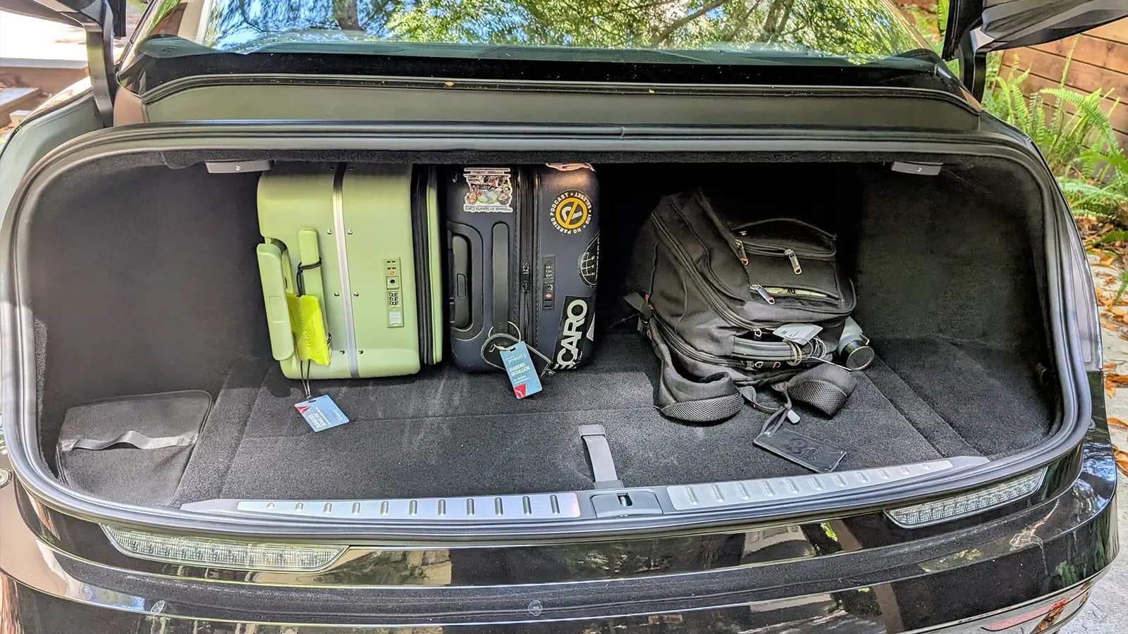 A Black 2025 Lucid Air Grand Touring rear cargo bay