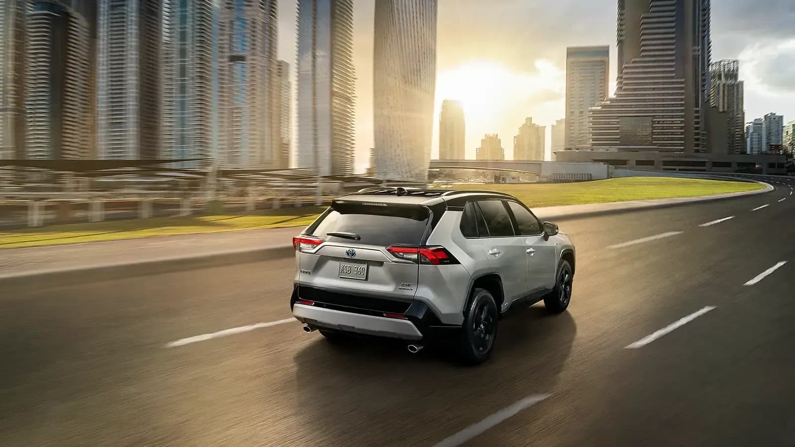 Toyota Hybrid driving down highway