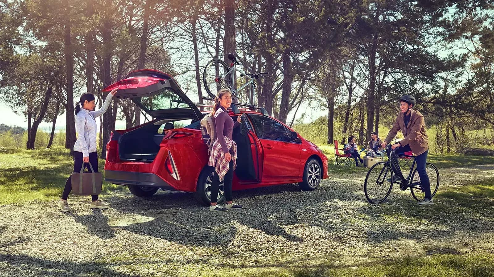 People outdoors with Hybrid Vehicle
