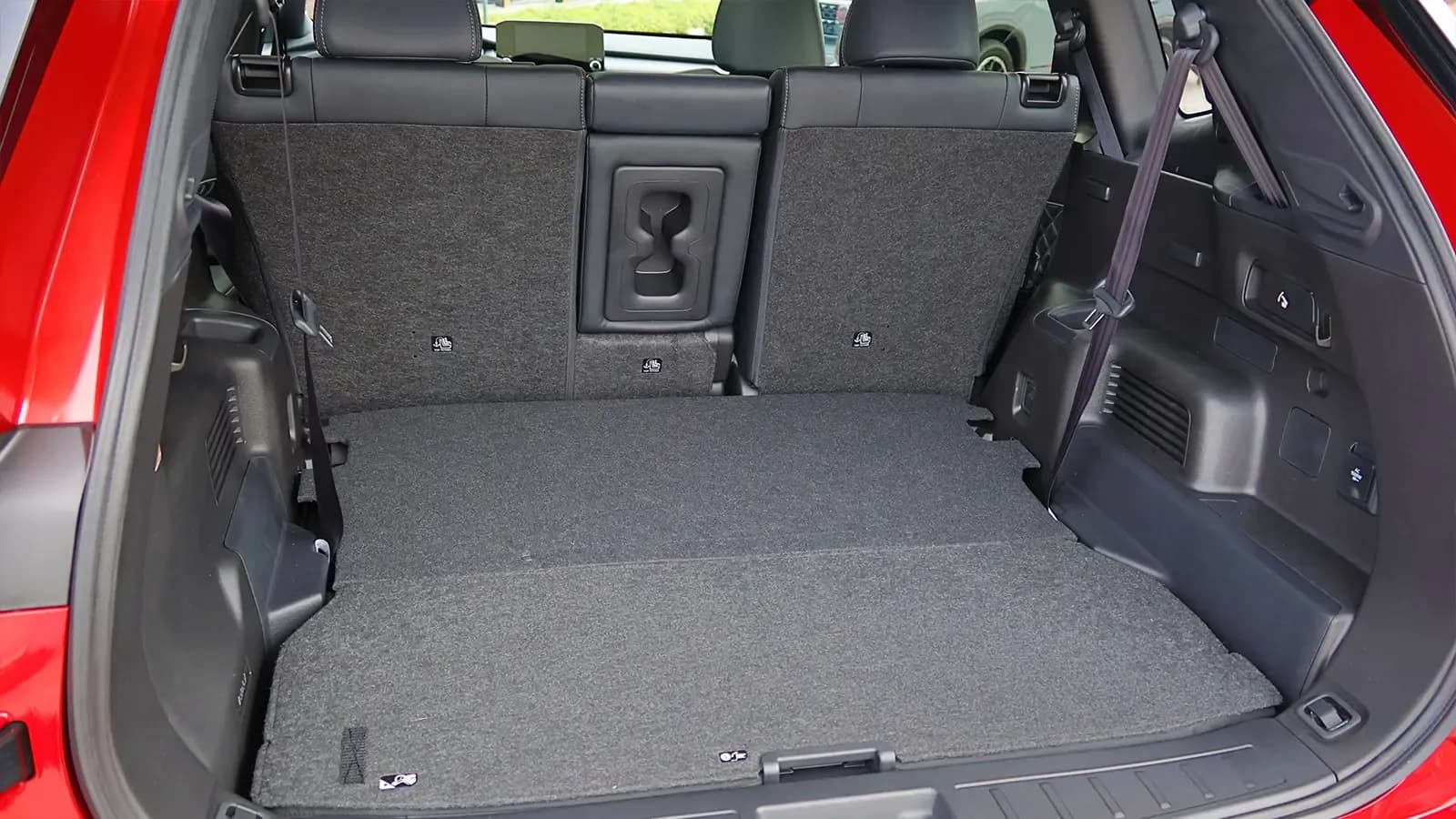 A red 2026 Nissan Rogue rear cargo bay view