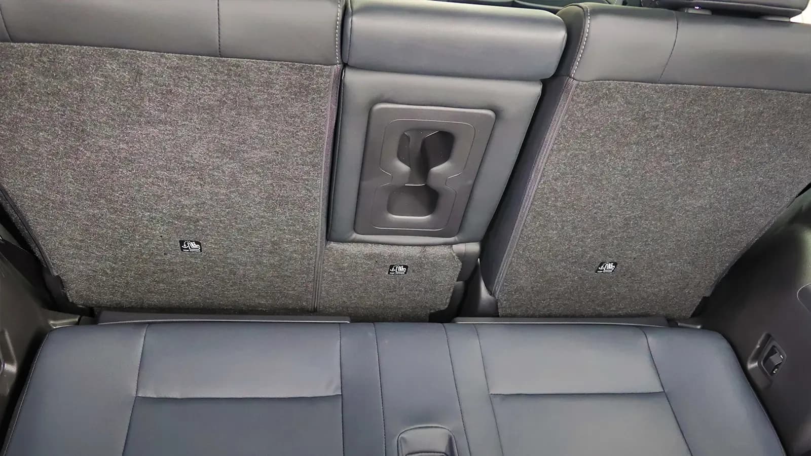A red 2026 Nissan Rogue 3rd row seat