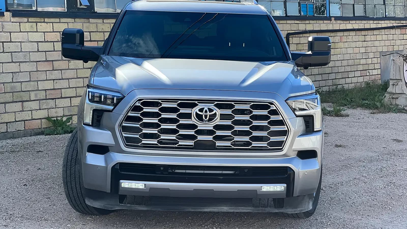 A silver 2026 Toyota Sequoia Hybrid Capstone front view