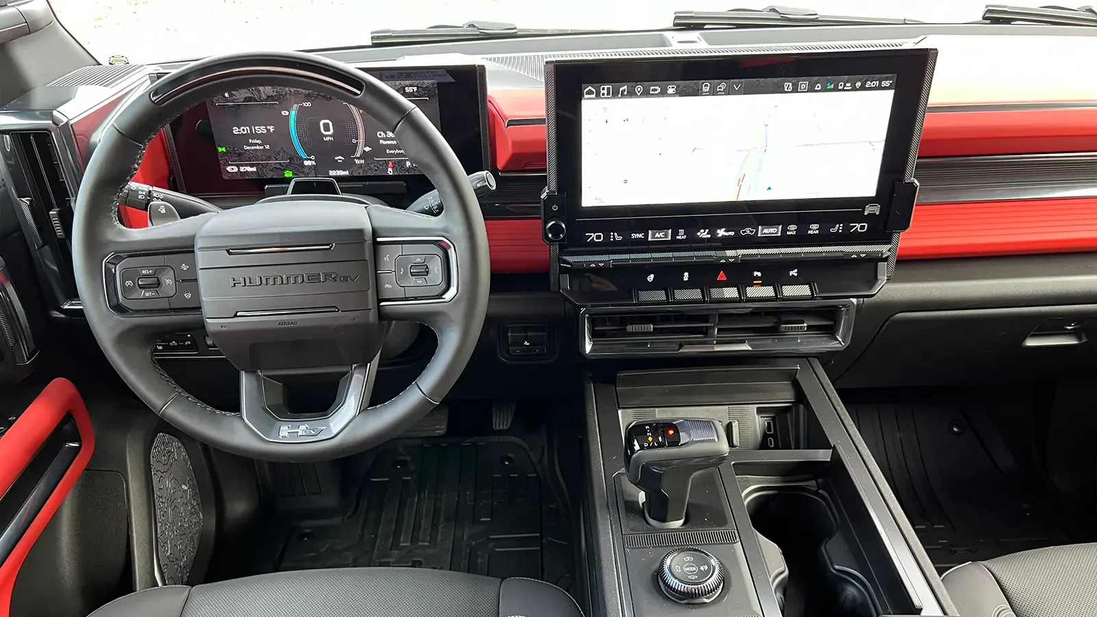 A dark gray 2026 GMC hummer EV pick up driver HUD view