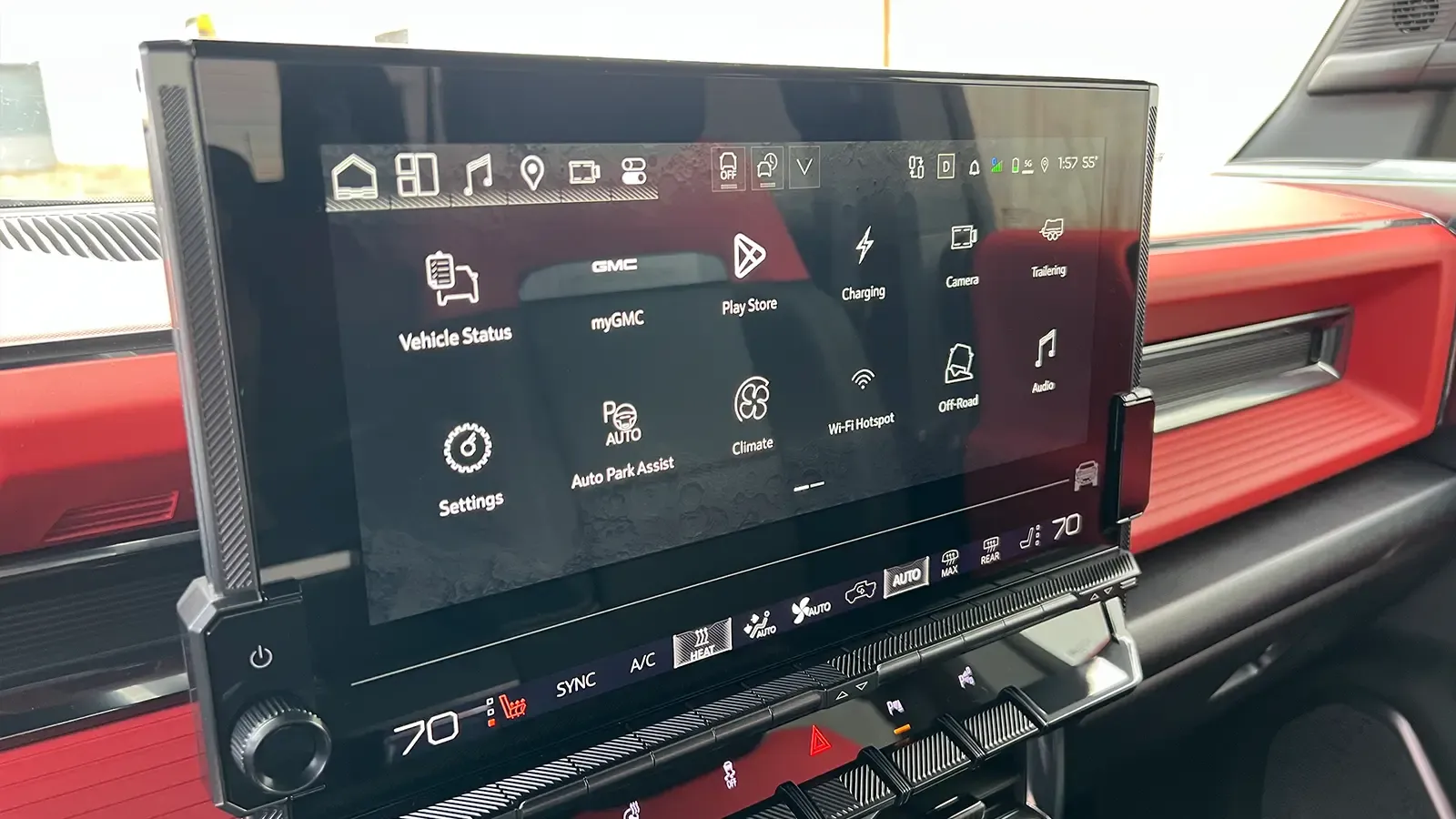 A dark gray 2026 GMC hummer EV pick up center console HUD