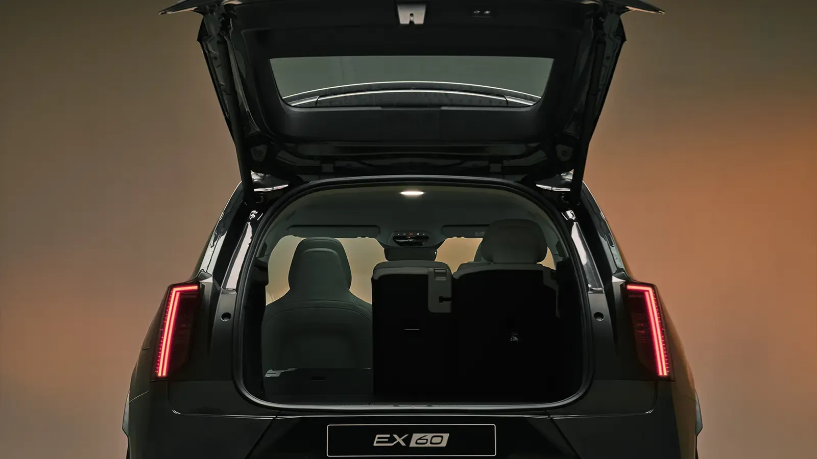 A dark gray 2027 Volvo EX60 trunk view