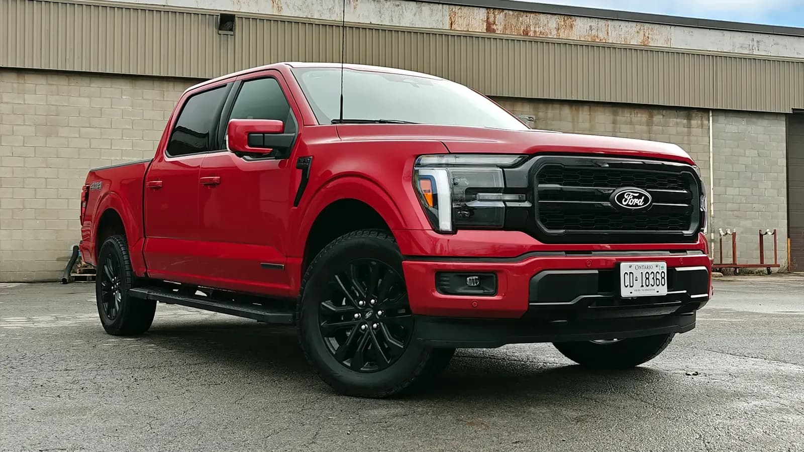 A red 2025 Ford F-150 power boost