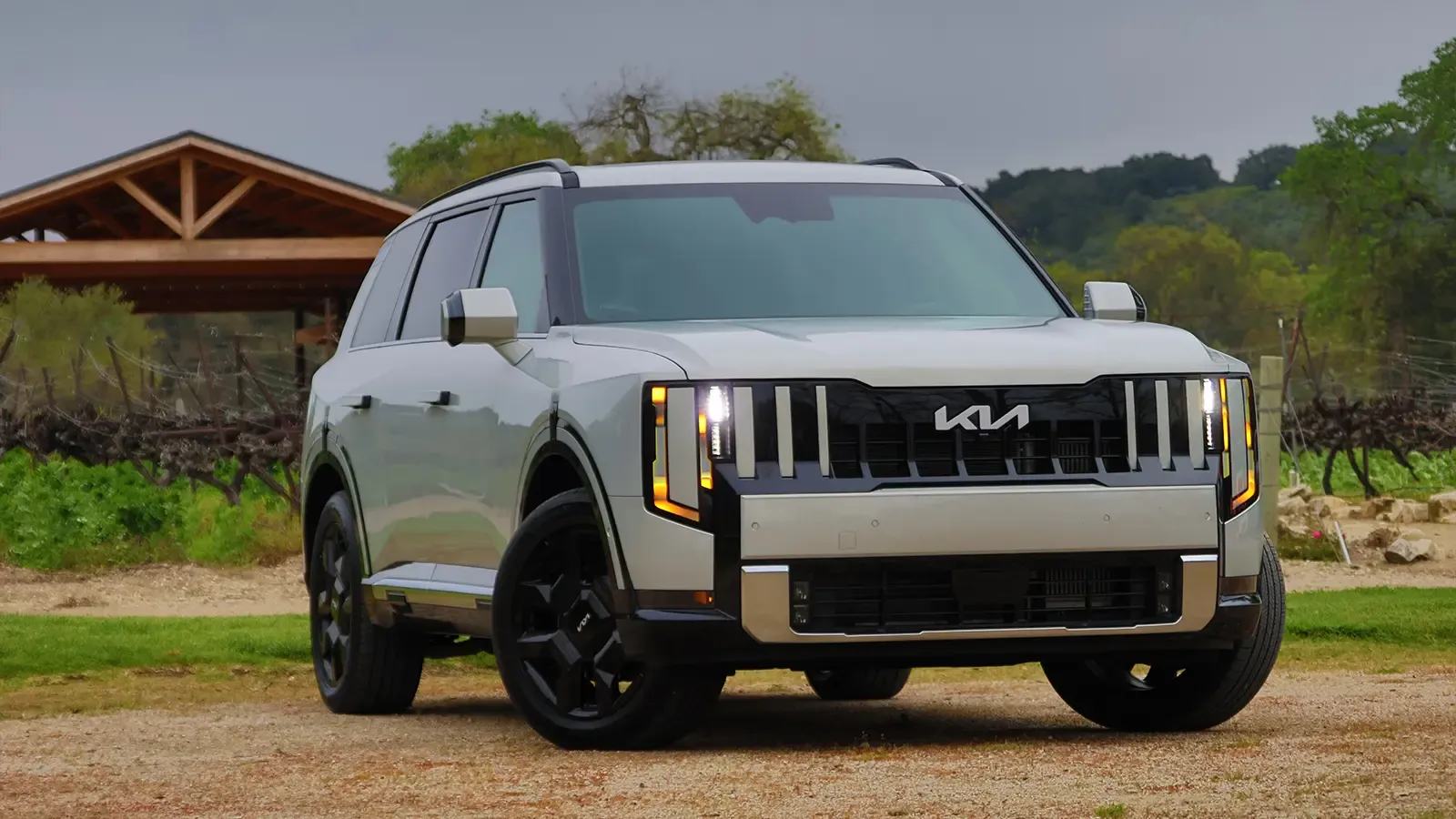 A 2027 Kia Telluride three quarter front view in a scenic area