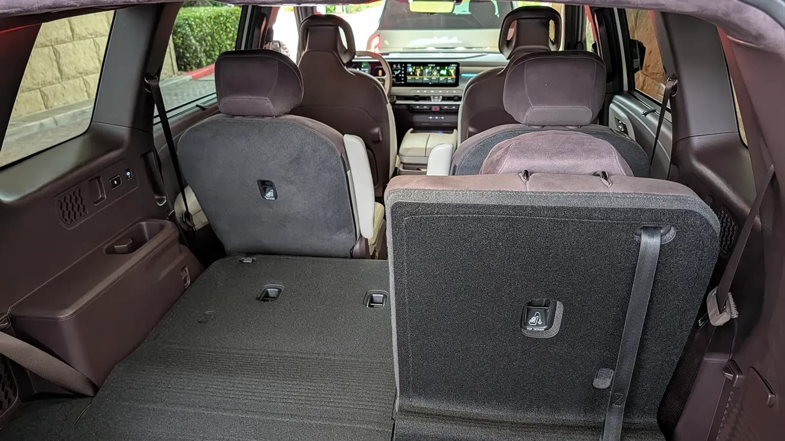 A 2027 Kia Telluride interior third row front interior view