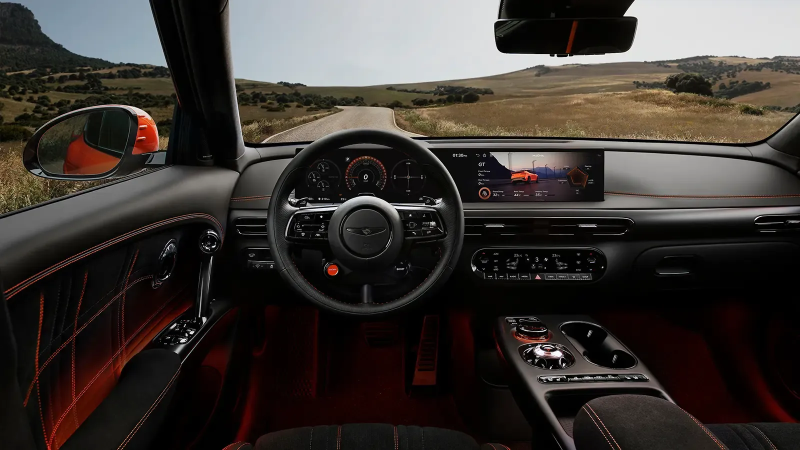 A 2027 Orange Genesis GV60 Magma driver interior front view