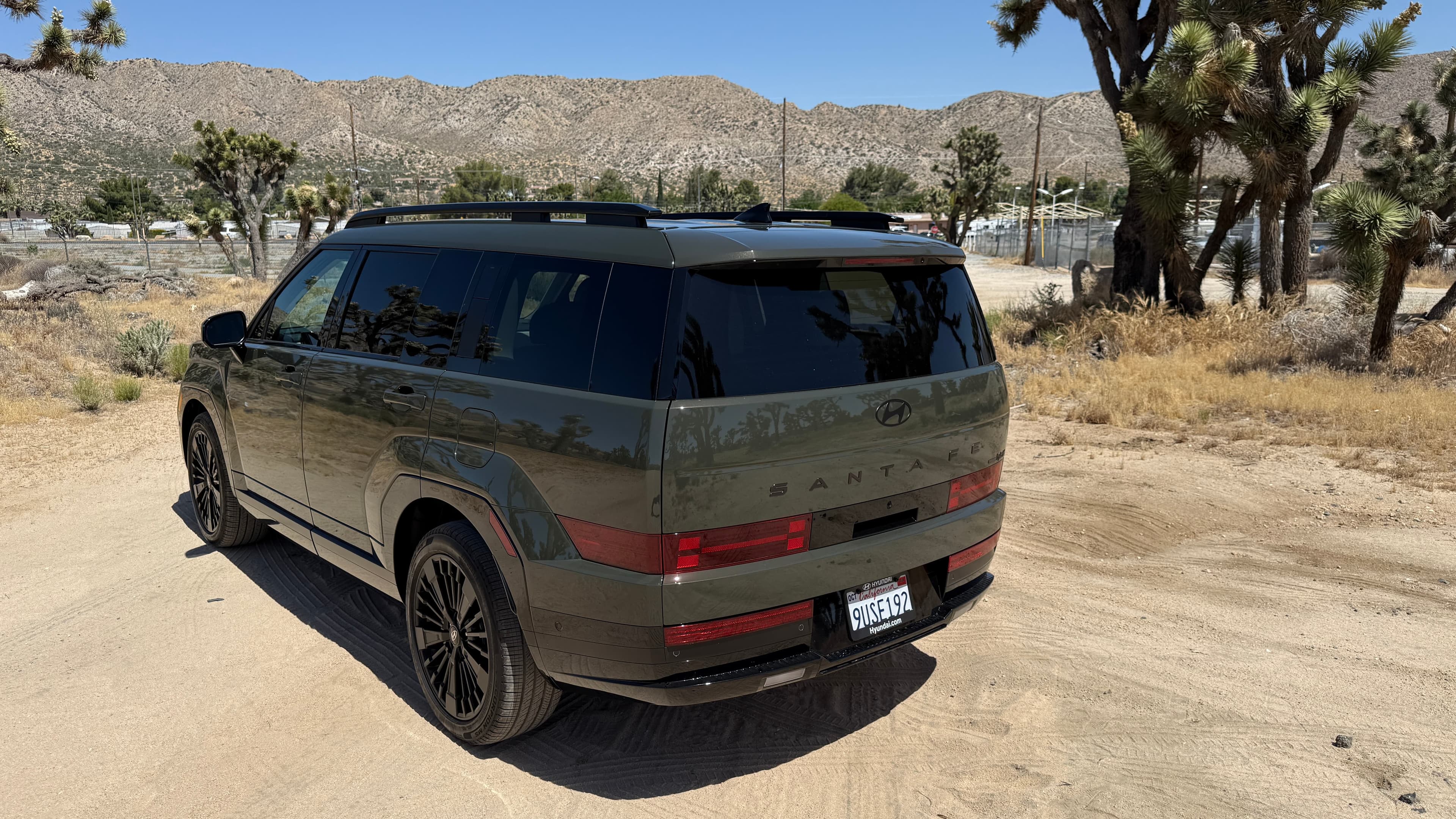 2026 Hyundai Santa Fe Hybrid back view standing in the desert